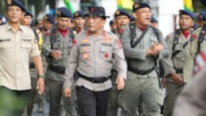 Pasukan Brimob Longmarch Pataka Perpindahan Mako Brimob